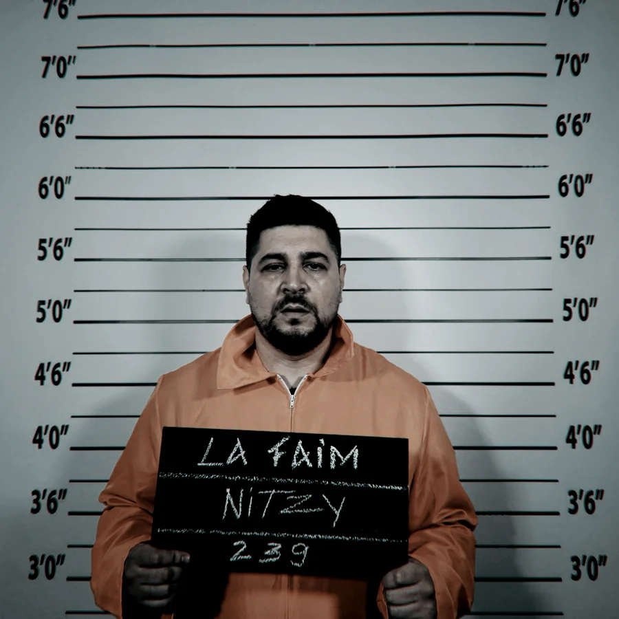 Fotografia de dosar a lui Nitzy, cu placa LA FAIM / NITZY / 239